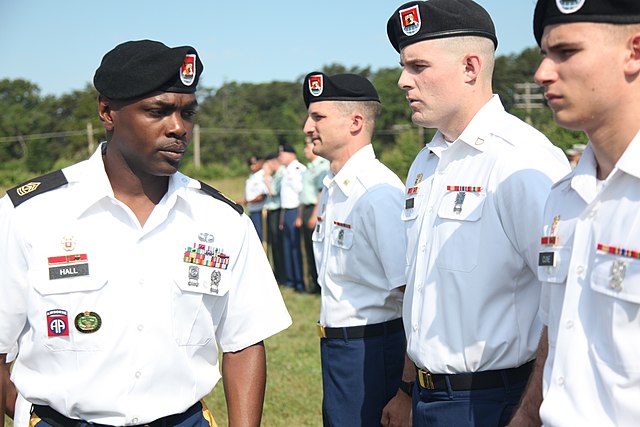 A First Sergeant with the 55th Signal Company (Combat Camera) gets his soldiers ready for a uniform inspection