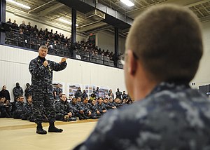 US Navy 120119-N-ED149-120 Master Chief Petty Officer of the Navy (MCPON) Rick D. West talks with Sailors stationed aboard the aircraft carrier USS.jpg