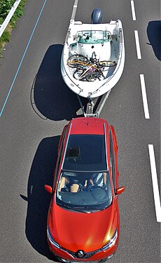 Vacationers on the highway toward the sun