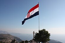 The largest flying flag in Croatia, atop the Srd mountain over the city of Dubrovnik Zastava na Srdu.JPG