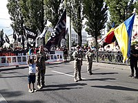 Юлія Микитенко в голові колони «Жіночого ветеранського руху» на неофіційному ("волонтерському") військовому параді до Дня незаалежності України 24 серпня 2021 (посередині).