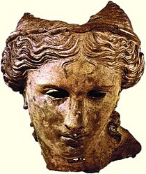 Fragment bronzové sochy
