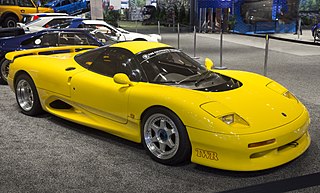 1991 Jaguar XJR-15 in Yellow, front right (NYIAS 2022)