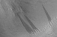 Dark slope streaks, as seen by HiRISE under HiWish program