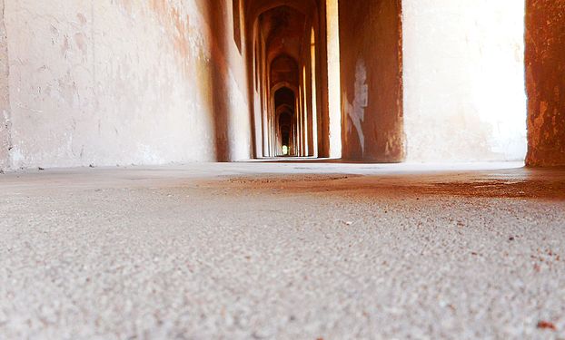 Bada Imambada is famous for its maze called 'Bhool Bhulaiyaa' in Hindi. It is built of identical 2.5 feet wide passageways like the one shown in this photograph. A true vanishing point.