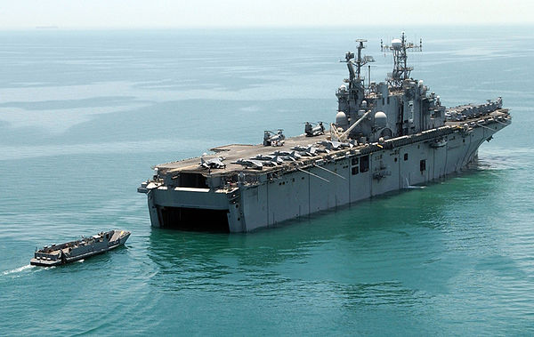 A landing craft utility returns to USS Belleau Wood with members of the 11th Marine Expeditionary Unit