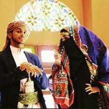 A Muslim couple joking around in a wedding. Bangla outfit 3.jpg