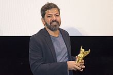 Director Bardroy Barretto receiving his Grand Prix at the Vienna Independent Film Festival Bardroy Barretto at the VIFF 2016 - Vienna Independent Film Festival.jpg