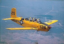 A U.S. Navy T-34B assigned to NAS Saufley Field in the 1950s. Beech T-34B in flight c1950s.jpeg