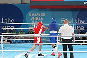 Deutsch: Boxen bei den Olympischen Jugendspielen 2018 Tag 12, 18. Oktober 2018 - Kampf um die Bronzemedaille im Fliegengewicht Mädchen – Timur Merjanow (Usbekistan, rot) schlägt Youssef Ali Karar Ali (Ägypten, blau) 5-0; Ringrichter ist Antonín Gaspar (Tschechien). English: Boxing at the 2018 Summer Youth Olympics on 18 October 2018 – Boy's heavyweight Bronze Medal Bout - Timur Merjanov (Uzbekistan, red) beats Youssef Ali Karar Ali (Egypt, blue) 5-0; Referee is Antonín Gaspar (Czech Republic). Español: Boxeo en los Juegos Olímpicos Juveniles de Verano de 2018 en 18 de octubre de 2018 - Medalla de bronce de peso pesado del muchacho: Timur Merjanov (Uzbekistán, roja) le gana a Youssef Ali Karar Ali (Egipto, azul) 5-0; El árbitro es Antonín Gaspar (Republica checa).