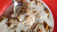 Bahasa Indonesia: Bubur Baayak adalah bubur khas Banjar. Bubur ini, memiliki rasa yang identik manis dan gurih, serta unik karena bentuk adonannya mirip dengan adonan cendol. English: Bubur Baayak is a typical Banjar porridge. This porridge, has an identical sweet and savory taste, and is unique because the dough shape is similar to cendol dough.. Banjar: Bubur Baayak adalah bubur khas Banjar. bubur ini, baisi rasa manis wan masin nang sama, wan unik marga bentuk adonan mirip lawan adonan cendol.