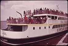 Circle Line cruise, 1973. Photo by Arthur Tress. CIRCLE LINE FERRY CARRIES TOURISTS TO STATUE OF LIBERTY IN UPPER NEW YORK BAY - NARA - 547838.jpg