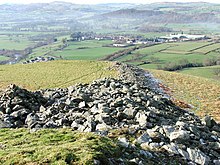 Caer Drewyn, Corwen, locally known as Mynydd-y-Gaer, the hill fort where Porius lives. Caer Drewyn 561128.jpg