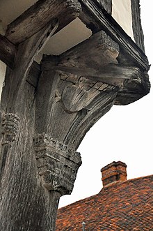 Carved dragon post below a dragon beam - The Old Wool Hall, Lavenham - geograph.org.uk - 1546714 Carved supporting beam - The Old Wool Hall, Lavenham - geograph.org.uk - 1546714.jpg