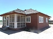 The Edwards House is the "Maples" model from the 1913 Aladdin Company catalog. The house is at Tumbleweed Park at 2250 S. McQueen Road. It is listed as historic by the Chandler Historical Society.