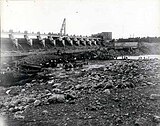 Construction of the cofferdam at Coon Rapids Dam.