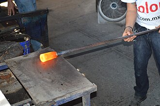 A modern-day marver being used to shape glass. Cristacolor22.JPG