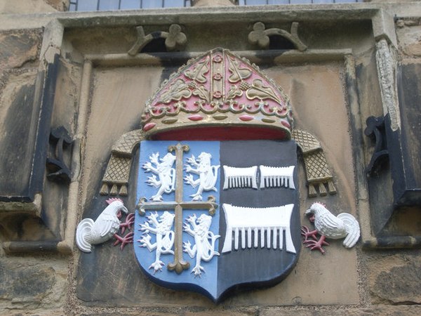 The coat of arms of Cuthbert Tunstall, bishop 1530-51 and 1554–59, on Durham Castle. They combine the arms of the diocese (left) with Tunstall's perso