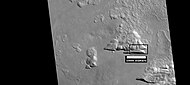 Depressions with straight southern walls, as seen by HiRISE under HiWish program. Box indicates part enlarged in images below. Image location is in Milankovič crater in Diacria quadrangle.