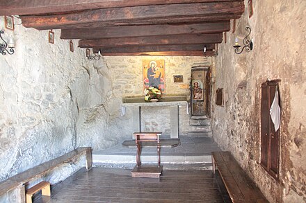 Chapel in Le Celle. St. Francis cell can be seen through the door on the right of the altar.