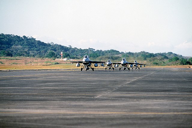 Four F-16 Fighting Falcon aircraft taxi to the parking apron upon their arrival for Exercise KINDLE LIBERTY 83.