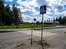 The typical Continental pedestrian crossing sign Finnish pedestrian crossing in Vimpeli.jpg