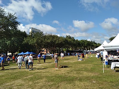 Tailgating on Fleming Field in 2021. Note Ben Hill Griffin Stadium above the trees