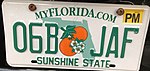 Florida Orange Blossom Sunshine State plate with PM (permanent) sticker.jpg