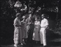 Group of actors, including Ellen Haworth and Fred, in a garden (I0001312).tif