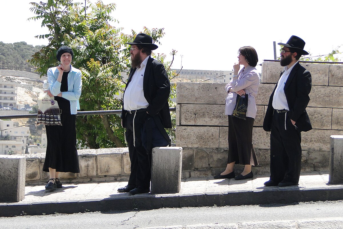 File:Haredi (Orthodox) Jewish Couples at Bus Stop - Outside Old City - Jeru...