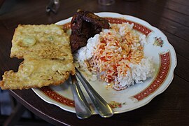 Javanese nasi campur with honey chicken and tempeh