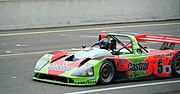 Kudzu DG-3 WSC -5 - Yojiro Terada, Jim Downing & Franck Freon on the pit straight at Le Mans 1995 (49627171966).jpg