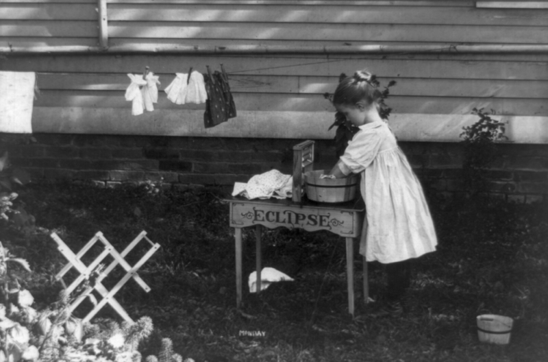 File:Little girl playing--doing laundry.png