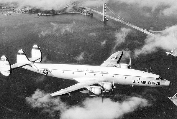 A MATS C-121G Super Constellation flying near the Golden Gate Bridge.