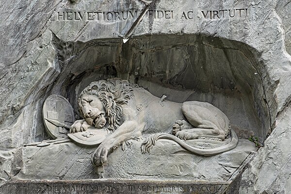 The Lion Monument in Lucerne. The incised Latin may be translated, "To the loyalty and courage of the Swiss".