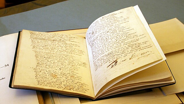 The manuscript of Pan Tadeusz held at Ossolineum in Wrocław. Adam Mickiewicz's signature is visible.