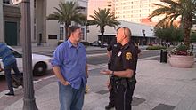 Mark Bunker talking to a police officer in Clearwater, Florida Mark Bunker and the Clearwater Police.jpg