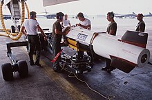 96th Munitions Maintenance Squadron airmen inspect an inert AGM-69 SRAM after removing it from the bomb bay of a B-1 Lancer Members of the 96th Munitions Maintenance Squadron inspect an inert AGM-69A short range attack missile (SRAM) after removing it from the bomb bay of a B-1B bomber aircraft DF-ST-88-03499.jpg