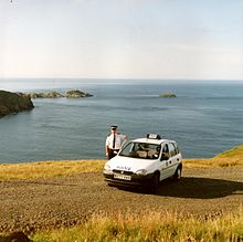 Northern Constabulary officer on the northern tip of Unst in the Shetland Islands, 1995 Northern Constabulary - Unst beat vehicle 1995 opposite Muckle Flugga (Shetland) Scotland.jpg