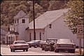 ONE OF THE ENTRANCES TO CHATTAROY, WEST VIRGINIA, NEAR WILLIAMSON, LEADS PAST A CHURCH OF GOD. THERE ARE MANY SMALL... - NARA - 556460.jpg