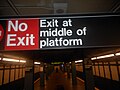 A "No Exit" sign above the platform