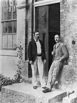 Charles Smart Roy and Charles Scott Sherrington (right), at the door of the Old Pathological Laboratory, Cambridge, 1893 Roy Sherrington 1893 01.jpg