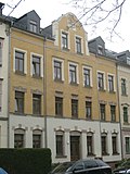 Apartment building in closed development with front garden