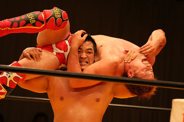 Sekimoto holds Ryoji Sai in an Argentine backbreaker rack in 2009