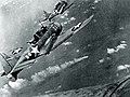 SBD-3 Dauntless bombers of VS-8 over the burning Japanese cruiser Mikuma on 6 June 1942 (cropped).jpg
