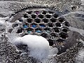 Manhole cover with soap foam