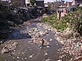 Slum and dirty river.jpg