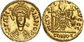Moneda acuñada en el reino merovingio (probablemente bajo Teodorico I de Austrasia), utilizando el nombre del emperador bizantino Justiniano I.