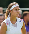 Stefanie Vögele competing in the first round of the 2015 Wimbledon Womens Doubles Qualifying Tournament with Jana Cepelova at the Bank of England Sports Grounds in Roehampton, England. The winners of two rounds of competition qualify for the main draw of Wimbledon the following week.