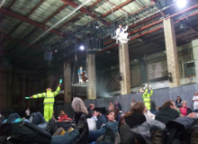 Orchester-Finalisten: during the cello solo, oboe (Dan Bates) and double-bass (Jeremy Watt) above an airport at the sea (Birmingham Opera production, 21 August 2012). Stockhausen Orchester-Finalisten Flugplatz 21Aug2012.png